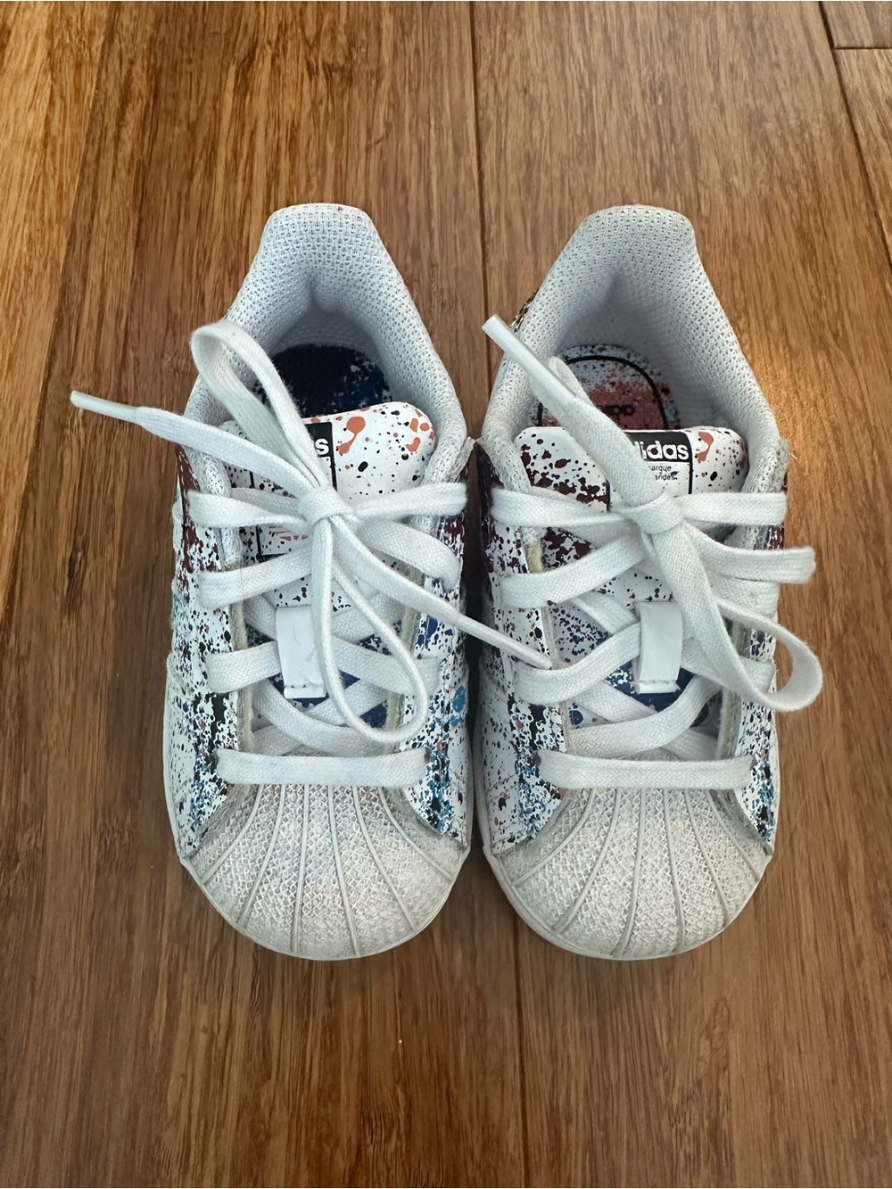 adidas Toddler White Superstar Sneakers with Multicolor Paint Splatter